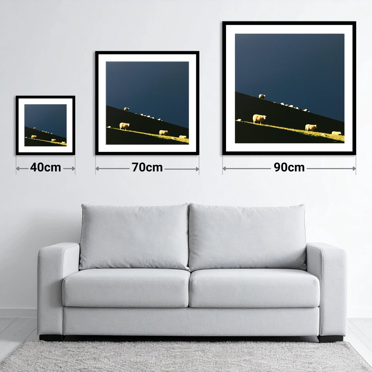 Herdwicks on a Silhouetted Fellside - size guide showing 40cm, 70cm and 90cm art prints