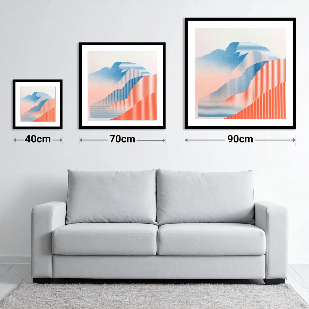 Geometric Scafell Pike in Coral - size guide showing 40cm, 70cm and 90cm art prints