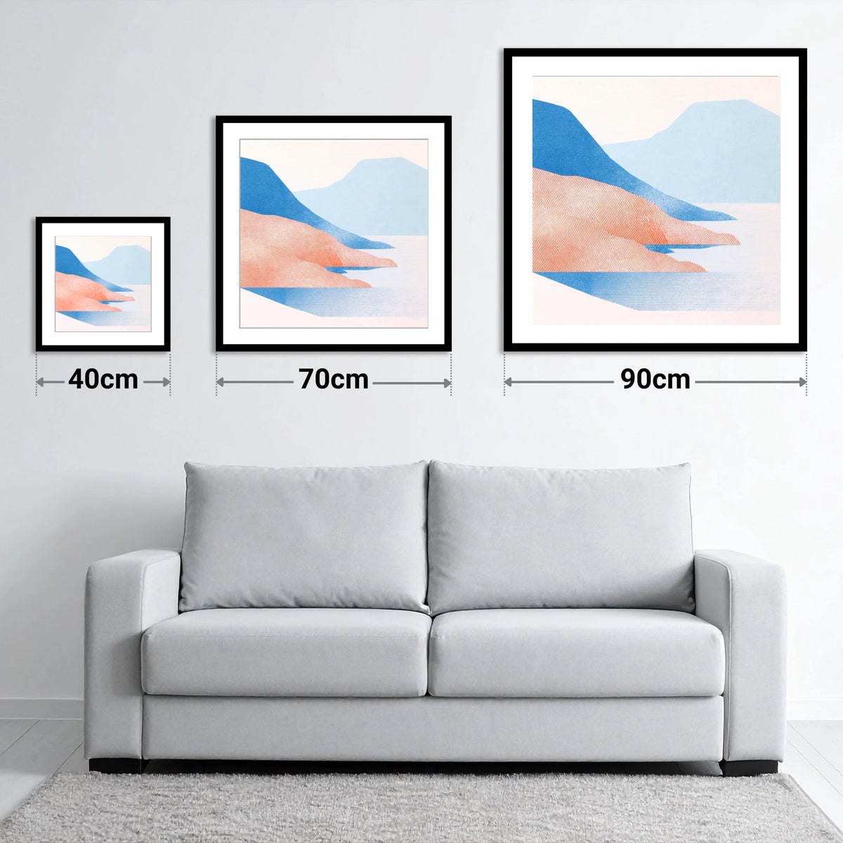 Coniston Water in Coral and Blue - size guide showing 40cm, 70cm and 90cm art prints