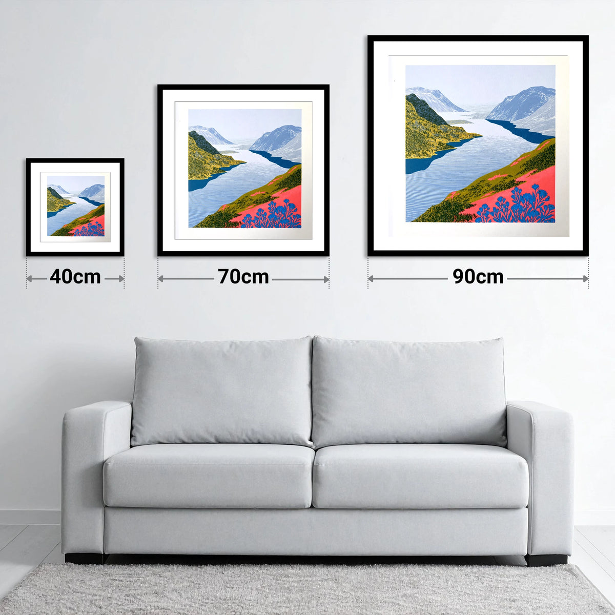 Graphic Lake And Fells In Coral - size guide showing 40cm, 70cm and 90cm art prints