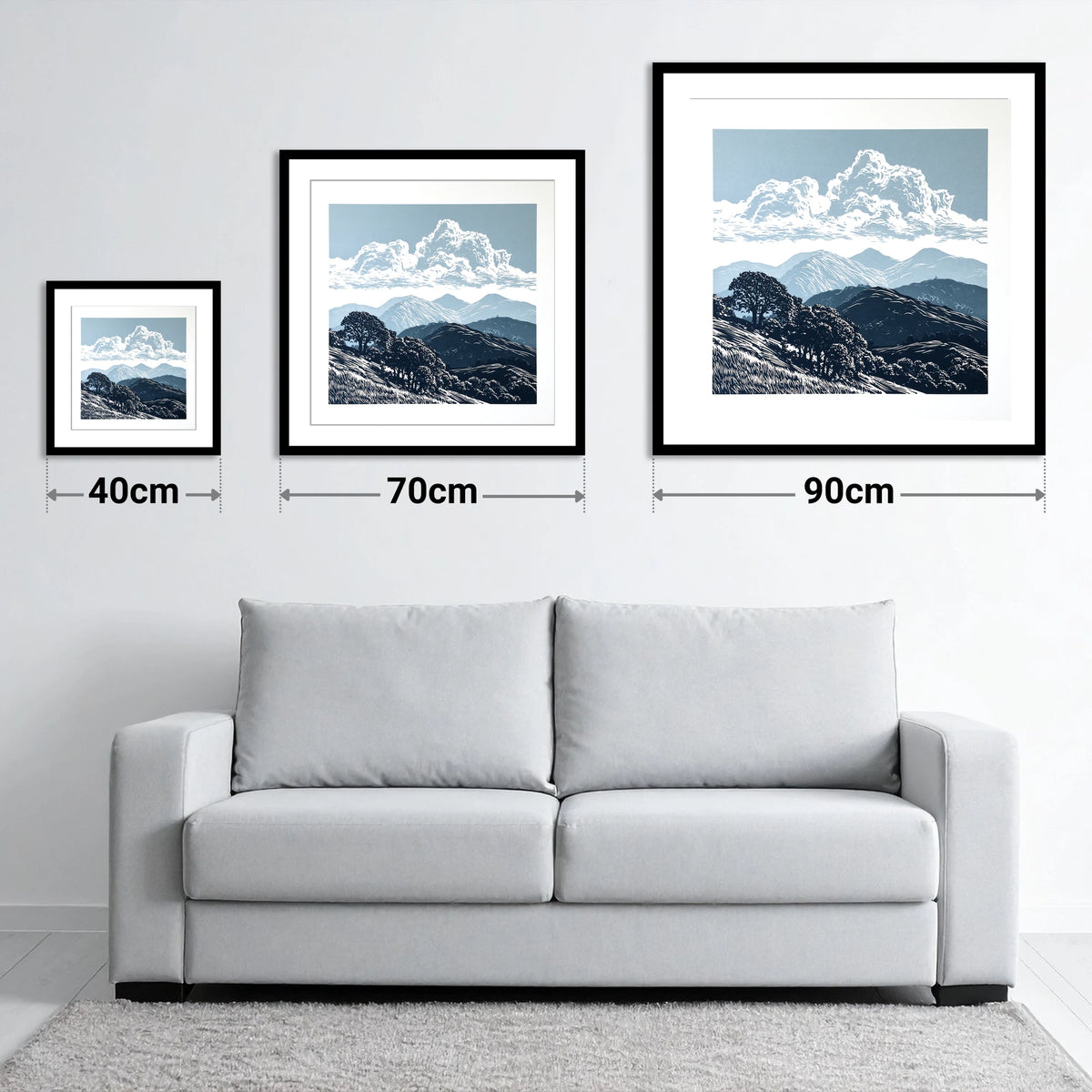 Rolling Fells Beneath Towering Clouds - size guide showing 40cm, 70cm and 90cm art prints