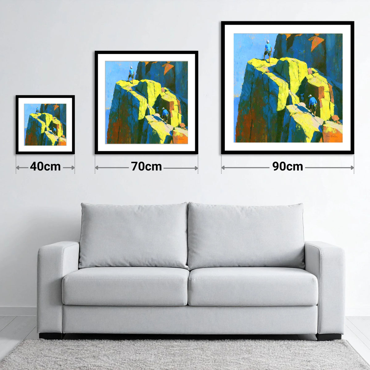 Mountaineers on a Sunlit Crag Pinnacle - size guide showing 40cm, 70cm and 90cm art prints