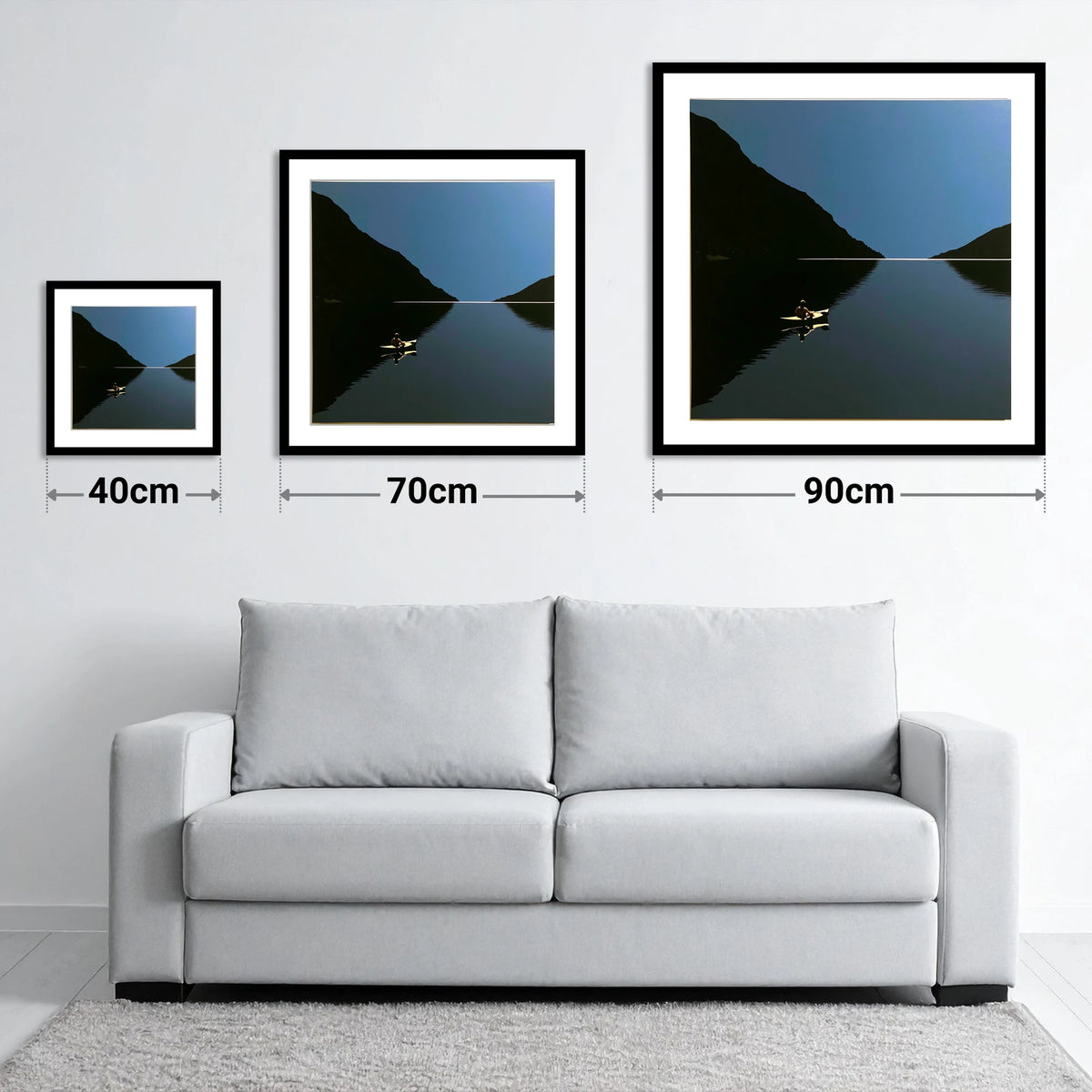 Illuminated Kayak on Dark Lake - size guide showing 40cm, 70cm and 90cm art prints
