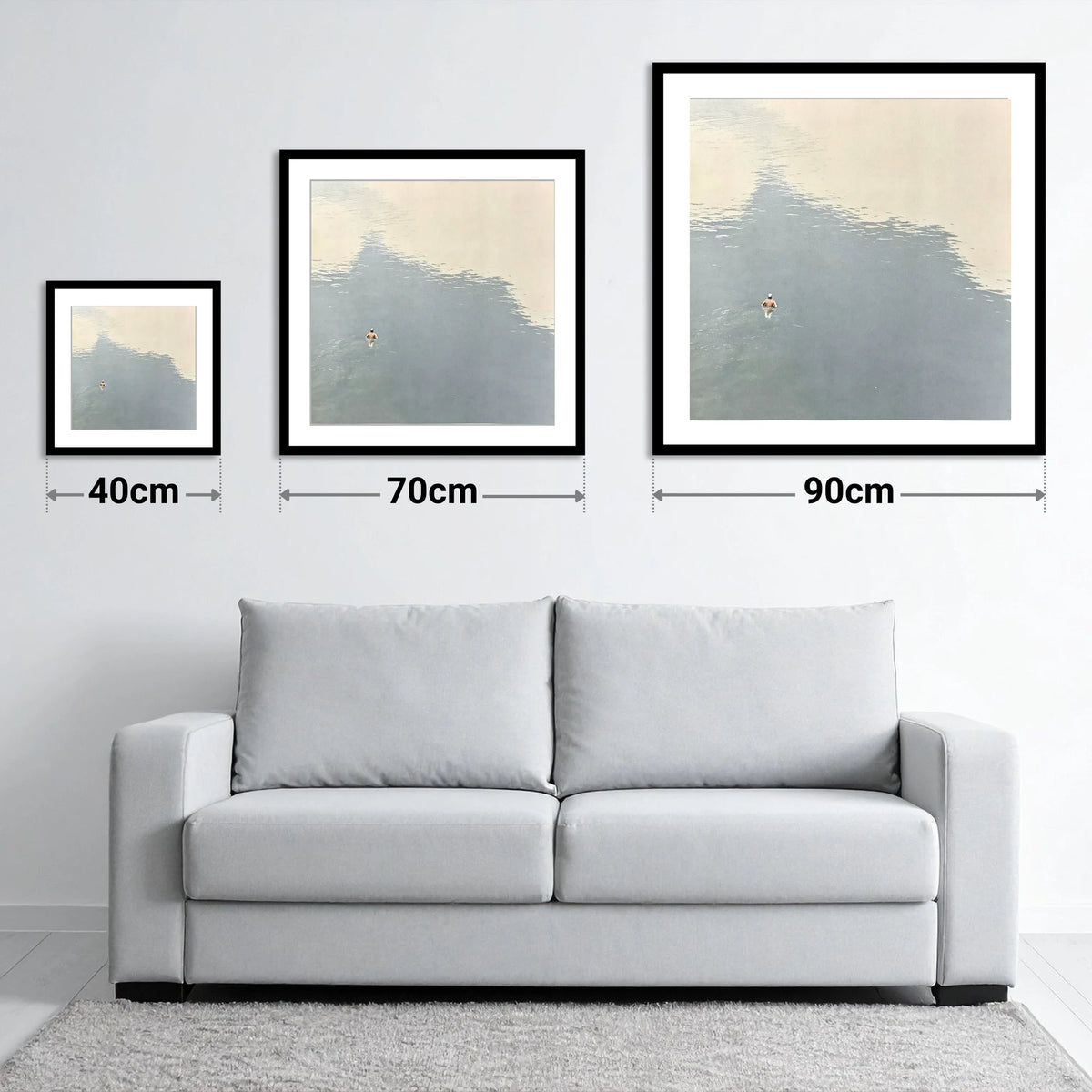 Lone Swimmer on Windermere - size guide showing 40cm, 70cm and 90cm art prints