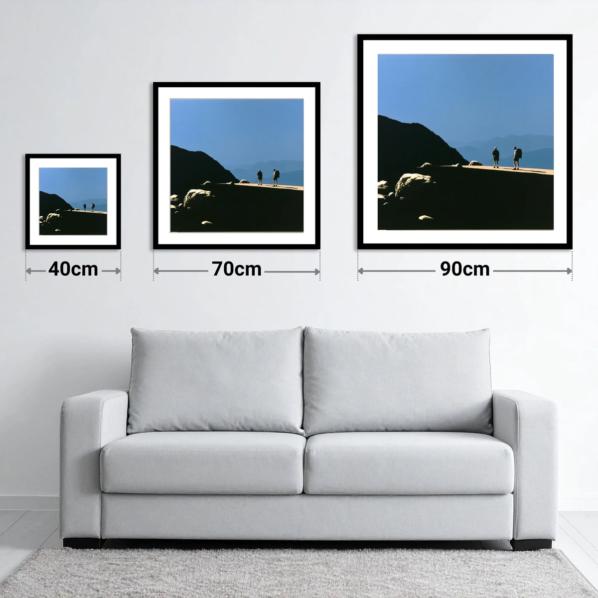 Hikers on a Sunlit Fell Ridge - size guide showing 40cm, 70cm and 90cm art prints