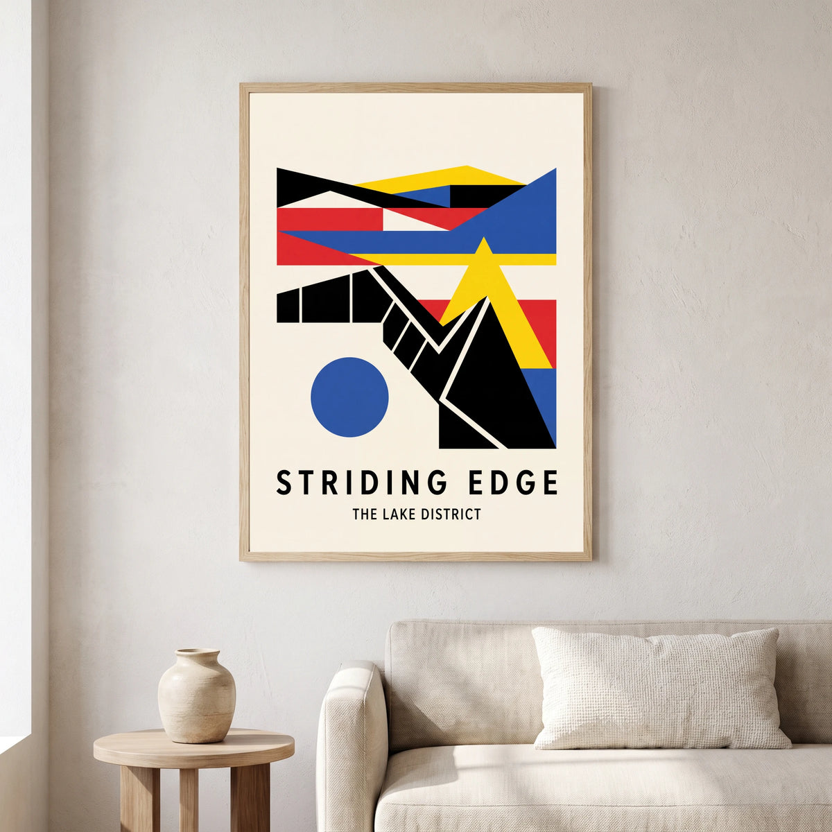 Striding Edge travel poster in a natural frame, hanging in a living