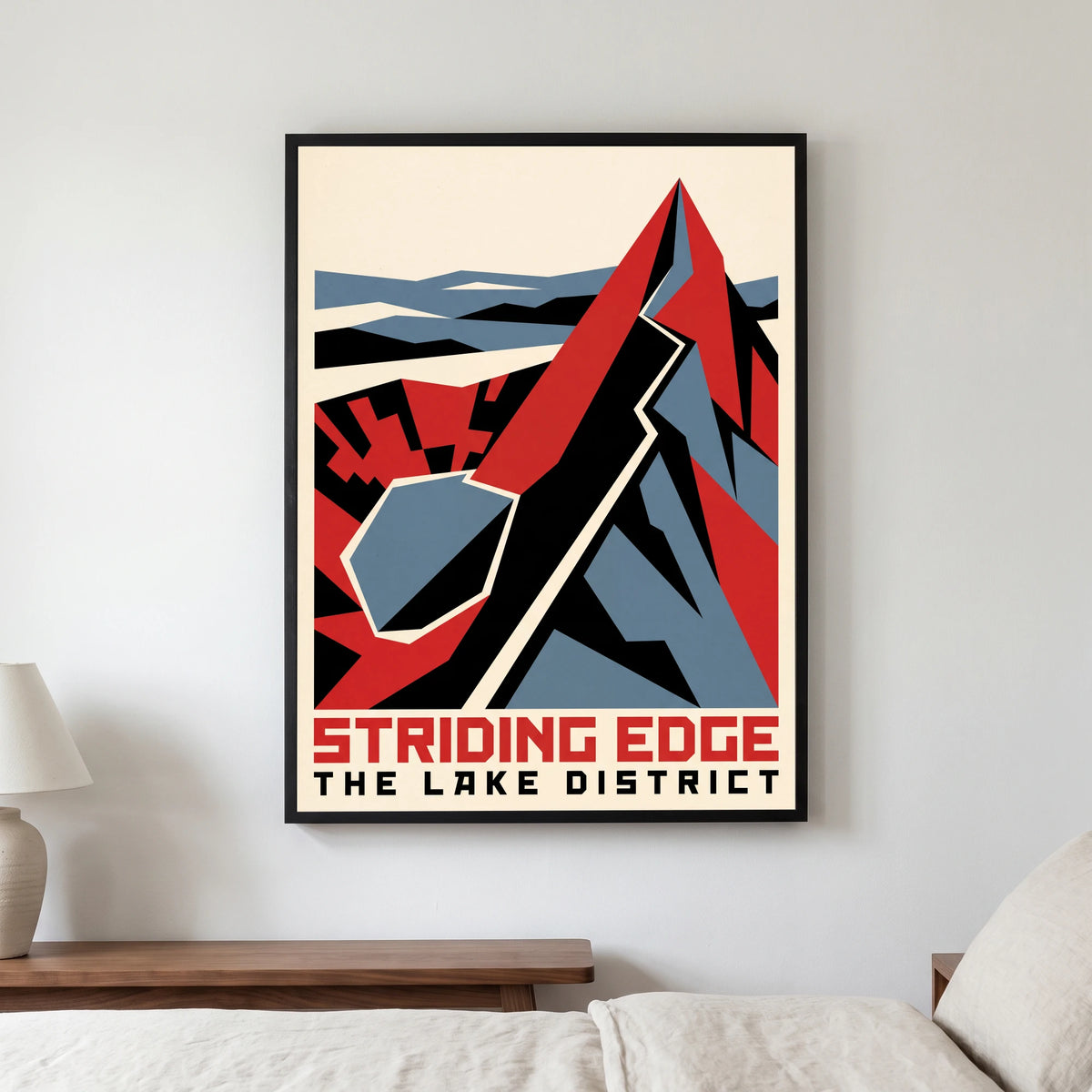Striding Edge travel poster in a black frame, hanging in a bedroom3