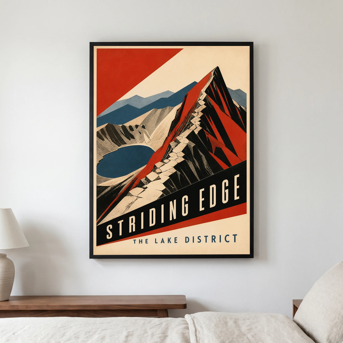 Striding Edge travel poster in a black frame, hanging in a bedroom3