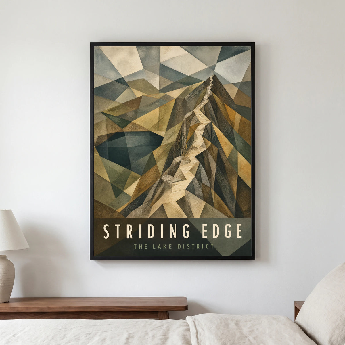 Striding Edge travel poster in a black frame, hanging in a bedroom3