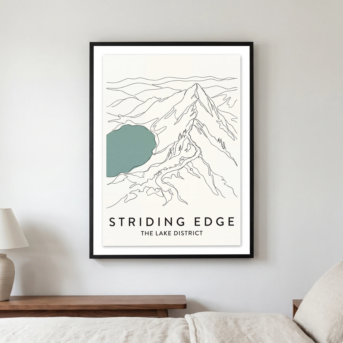 Striding Edge travel poster in a black frame, hanging in a bedroom3