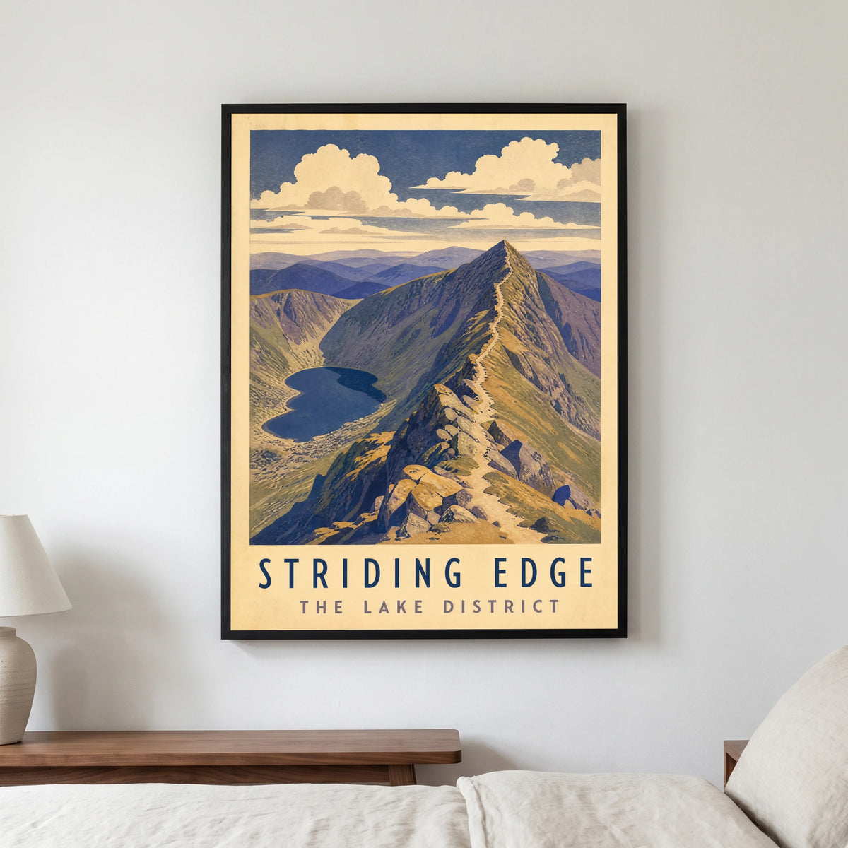 Striding Edge travel poster in a black frame, hanging in a bedroom3