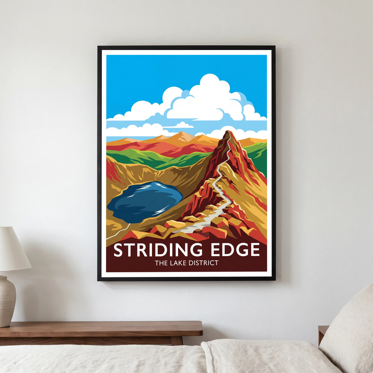 Striding Edge travel poster in a black frame, hanging in a bedroom3