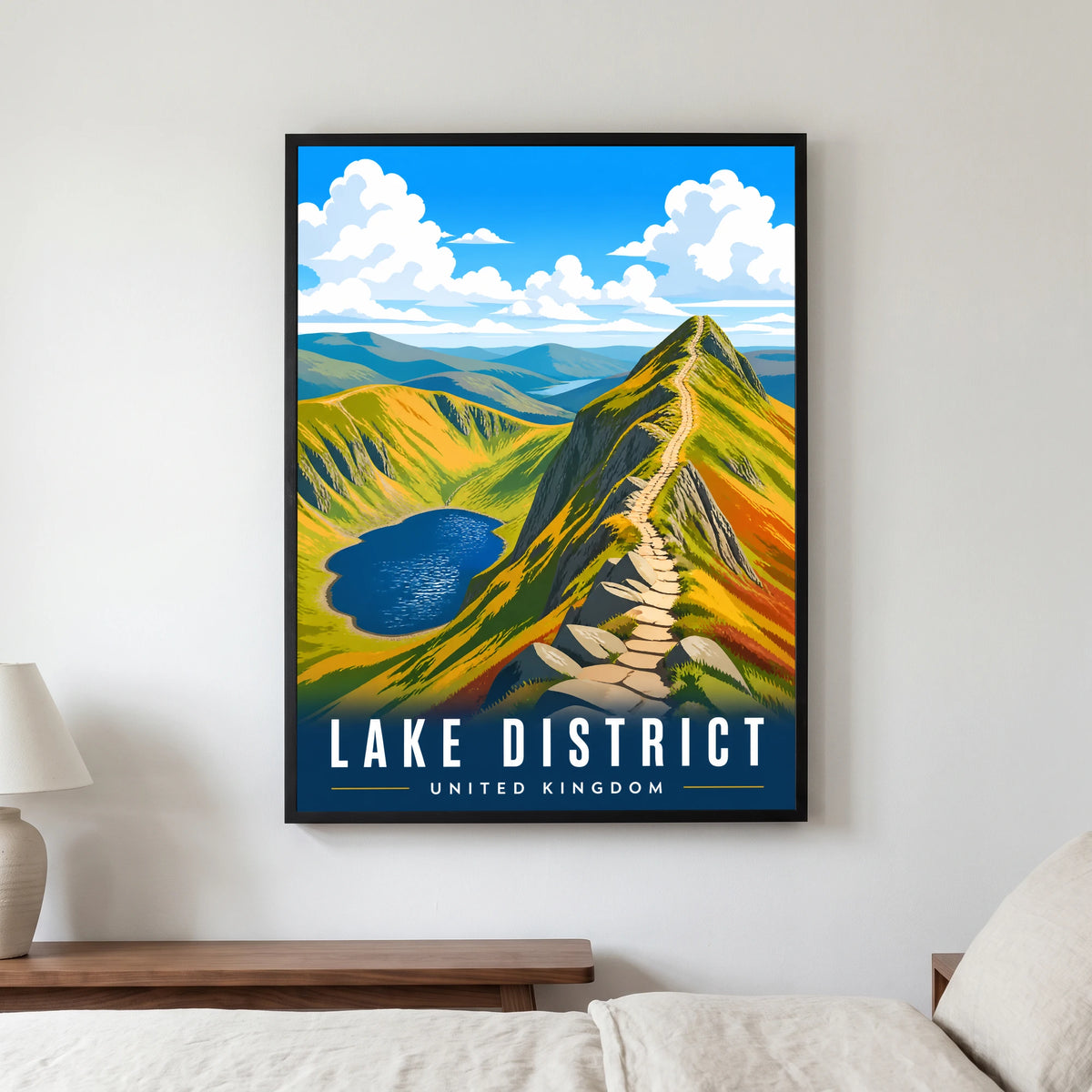 Striding Edge travel poster in a black frame, hanging in a bedroom3