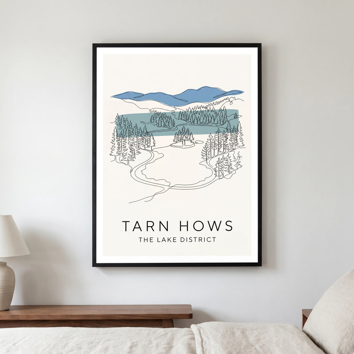 Tarn Hows travel poster in a black frame, hanging in a bedroom3