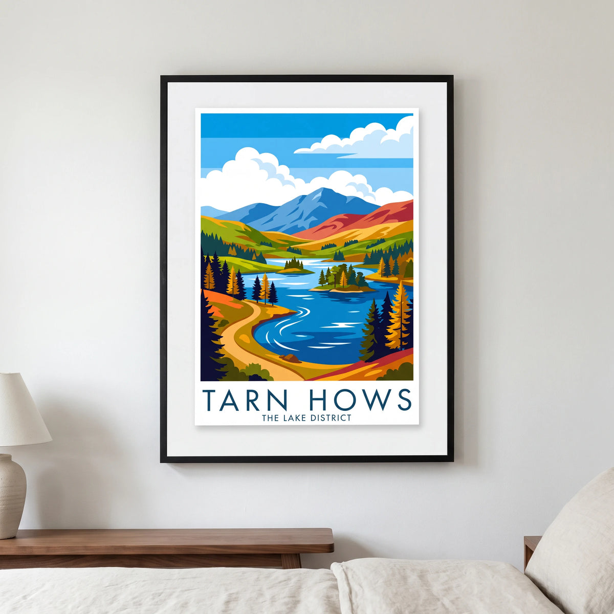 Tarn Hows travel poster in a black frame, hanging in a bedroom3