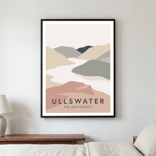 Ullswater travel poster in a black frame, hanging in a bedroom3