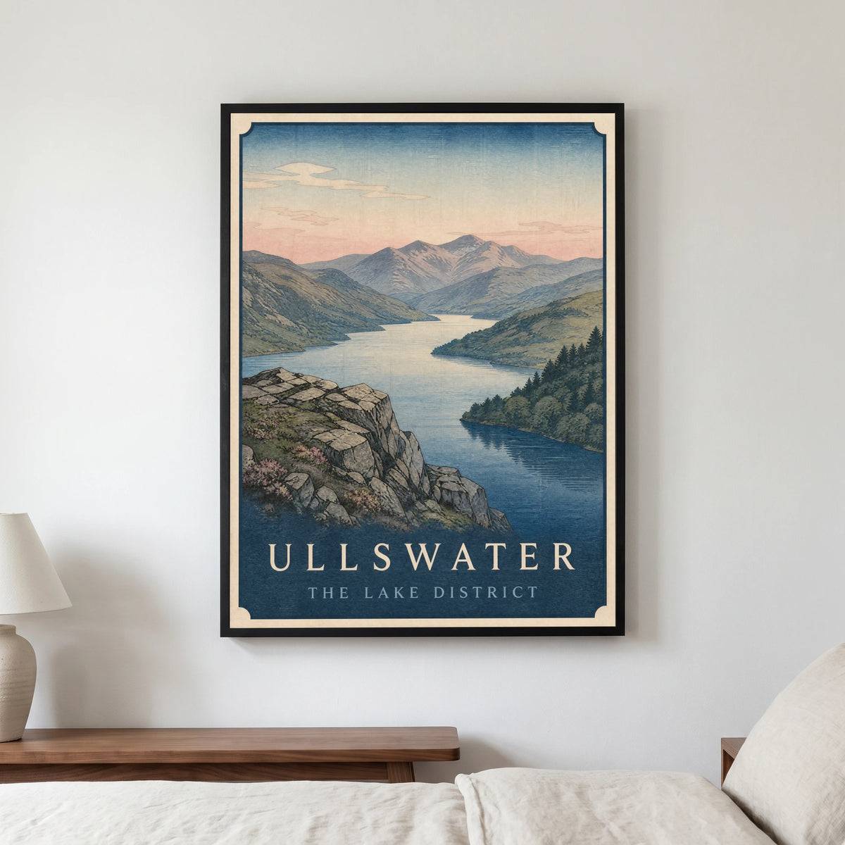 Ullswater travel poster in a black frame, hanging in a bedroom3