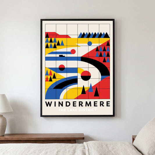 Windermere travel poster in a black frame, hanging in a bedroom3