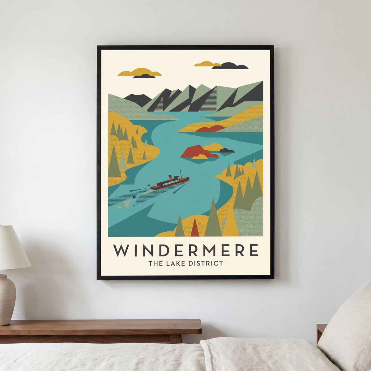 Windermere travel poster in a black frame, hanging in a bedroom3