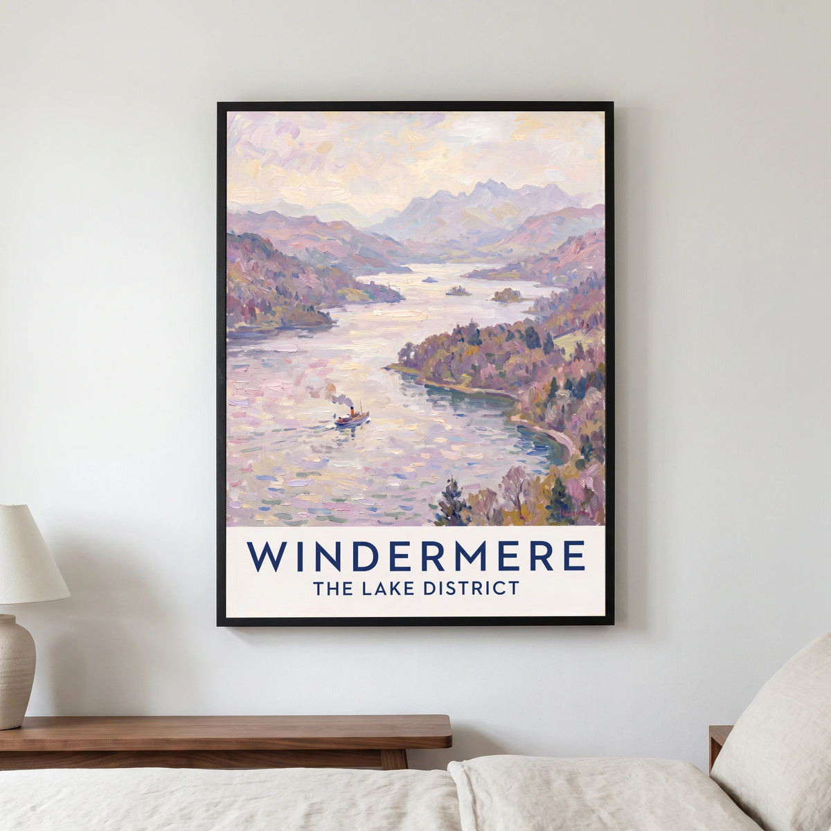 Windermere travel poster in a black frame, hanging in a bedroom3
