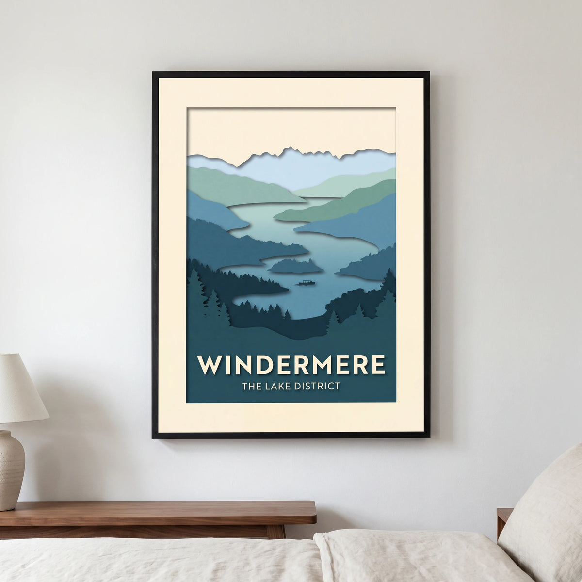 Windermere travel poster in a black frame, hanging in a bedroom3