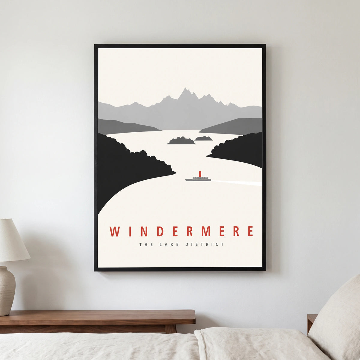 Windermere travel poster in a black frame, hanging in a bedroom3