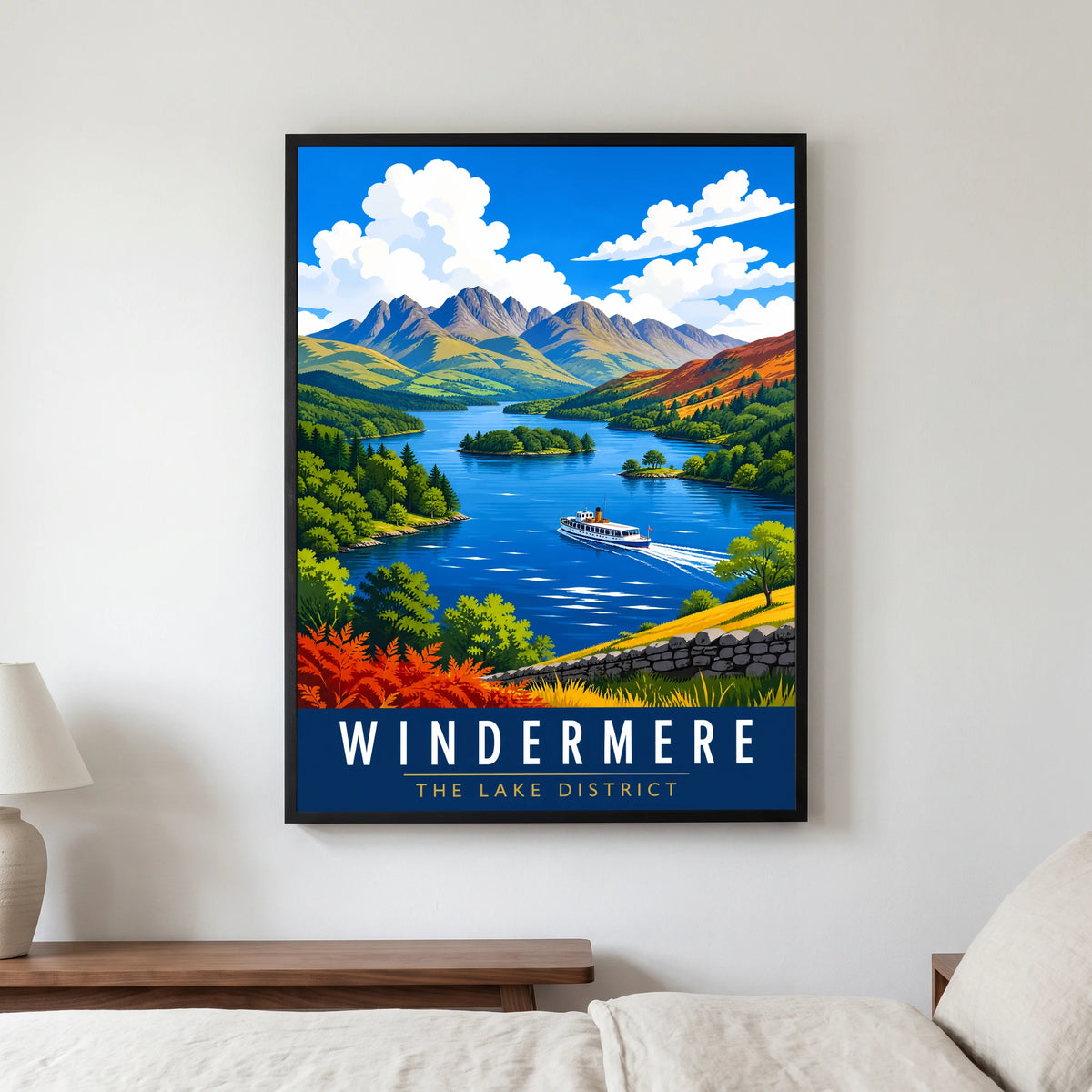 Windermere travel poster in a black frame, hanging in a bedroom3